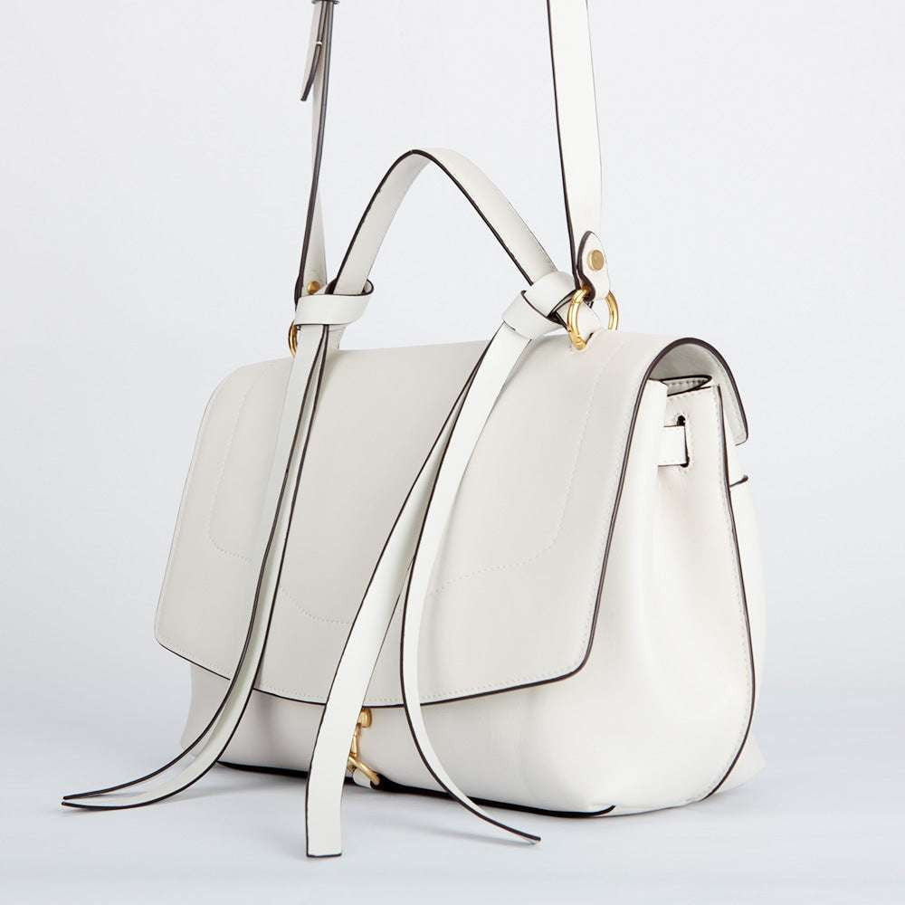 chic white handbags, leather clamshell handbags, summer handbag trends - available at Sparq Mart