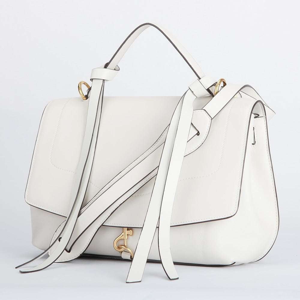 chic white handbags, leather clamshell handbags, summer handbag trends - available at Sparq Mart