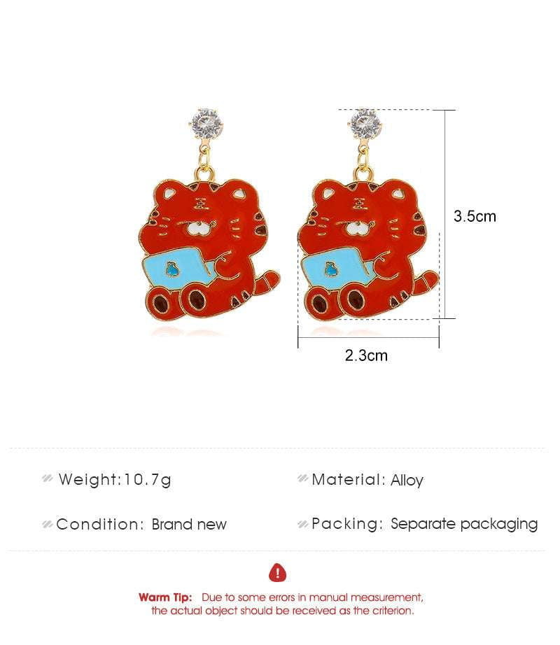 sparkling diamond jewelry, unique style earrings, zodiac tiger earrings - available at Sparq Mart