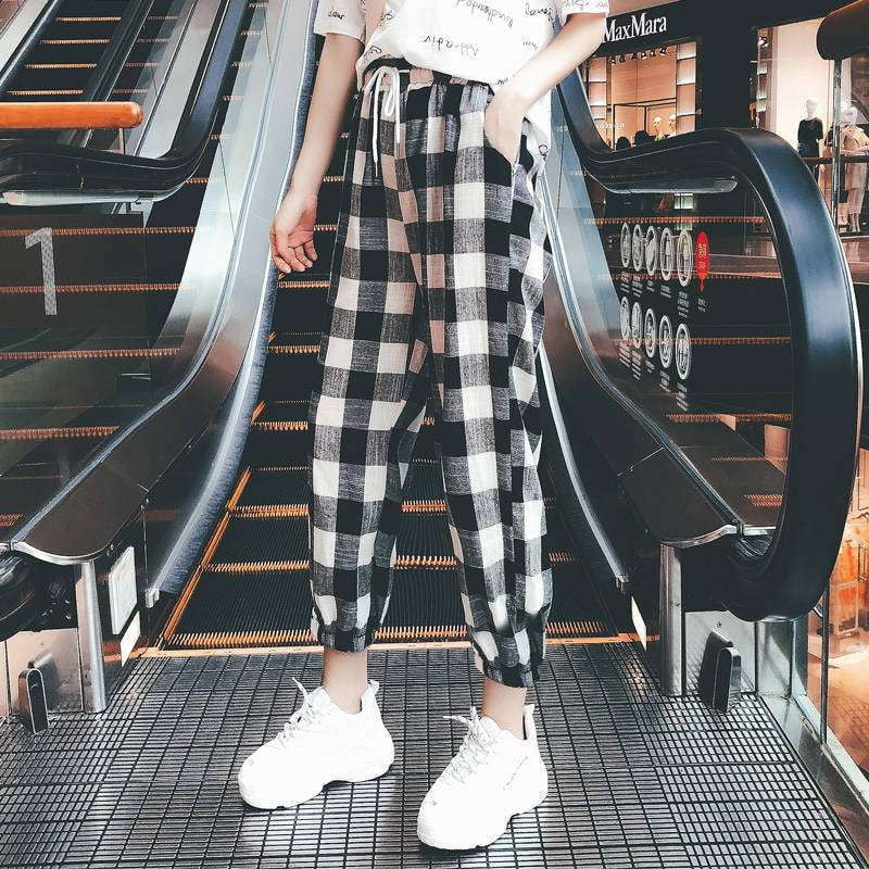 Fashionable checkered bottoms, Trendy plaid trousers, Versatile plaid pants - available at Sparq Mart