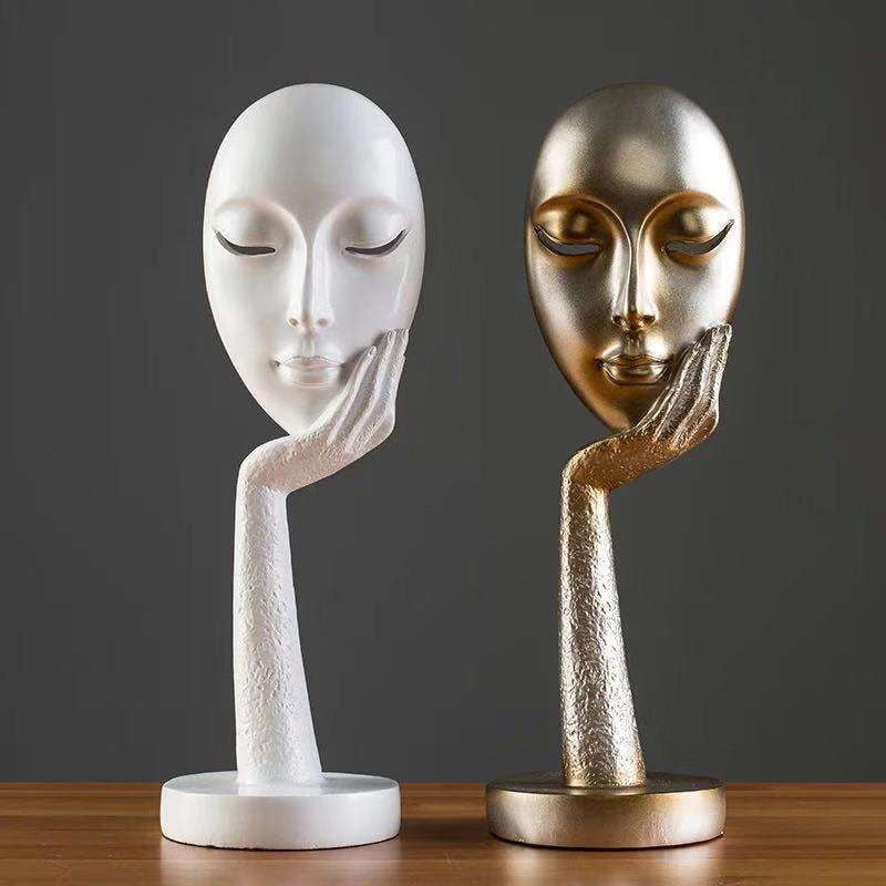 artistic resin figurines, creative decor pieces, modern home accents - available at Sparq Mart